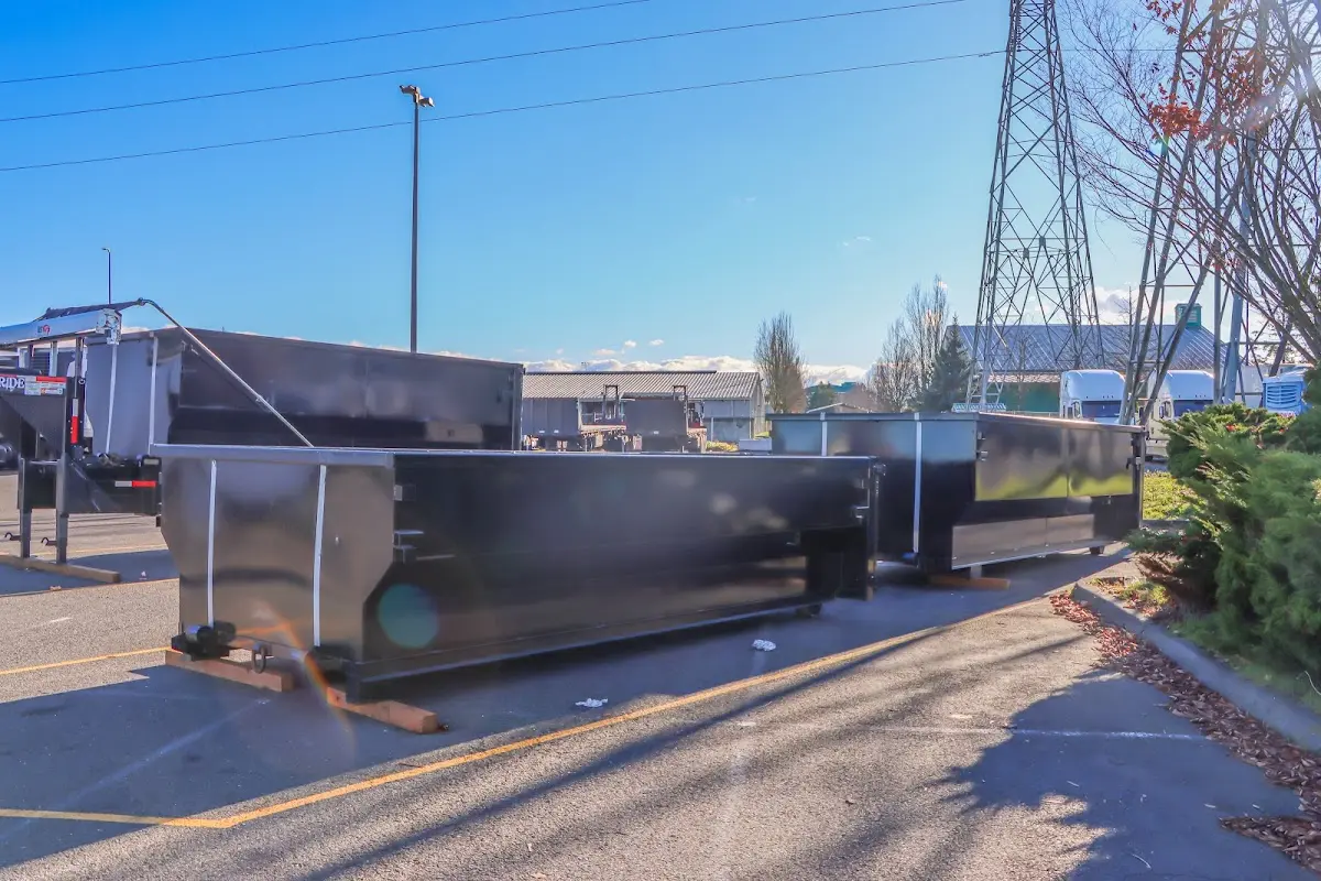 Roll-off dumpster ready for waste disposal at job site for 2 Yard Dumpster Rental in Blackfoot